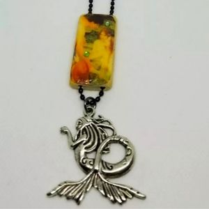 Mermaid necklace on bamboo tile Waterhouse